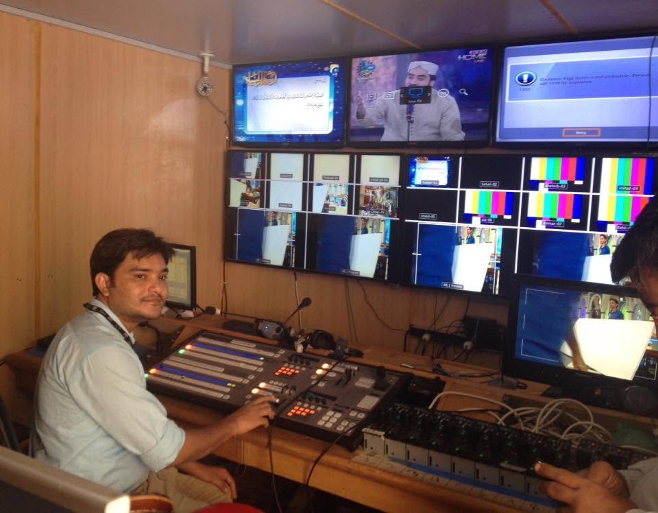 In an edit suite or control room, photo 3