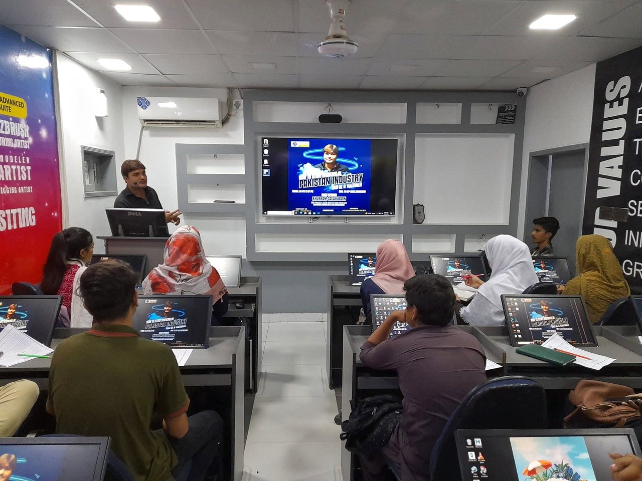 Our founder speaking to students in a classroom